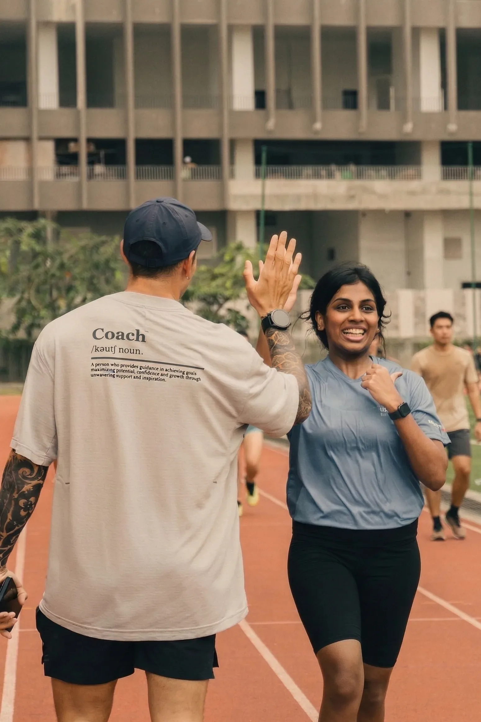 Coach and client high five